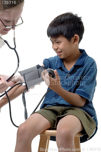 Image of Young child having an examination