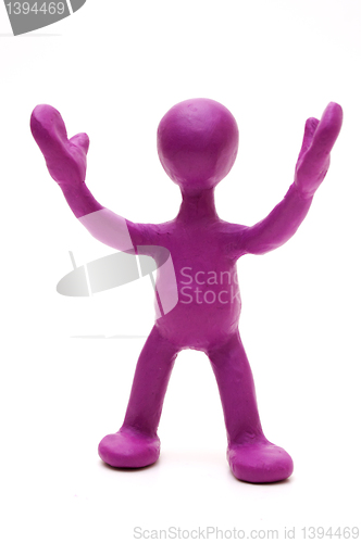 Image of Purple puppet of plasticine signing by hands