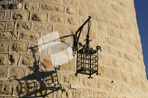 Image of Jerusalem windmill and a lamp