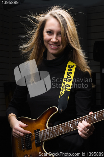 Image of Woman with guitar
