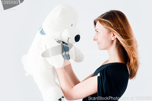Image of Pretty woman with white bear