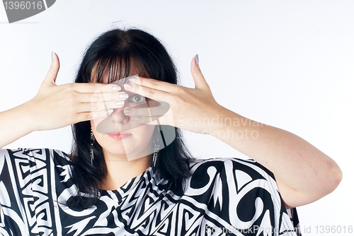 Image of Woman covering eyes