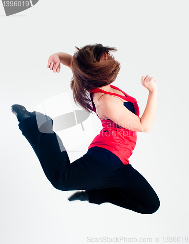 Image of Dancing girl in jump