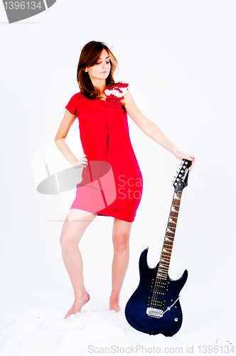 Image of Funny woman with guitar