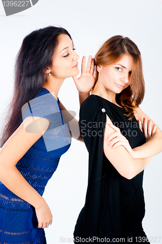 Image of Gossiping women
