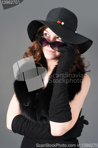 Image of Retro style woman with glasses