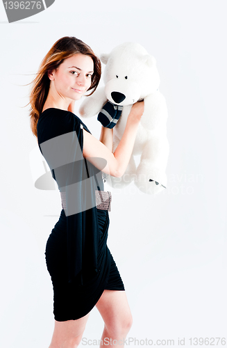 Image of Pretty woman with white bear