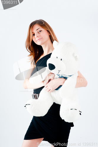 Image of Pretty woman with white bear