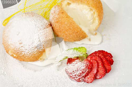 Image of Dessert of ice-cream at biscuit