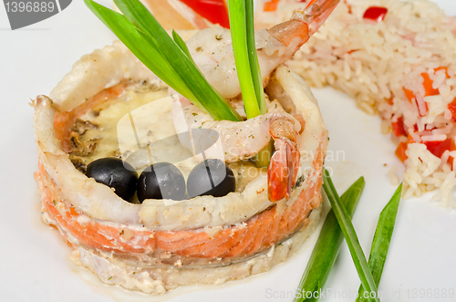 Image of fish with rice and vegetables