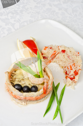 Image of fish with rice and vegetables