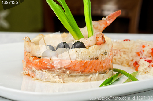 Image of fish with rice and vegetables