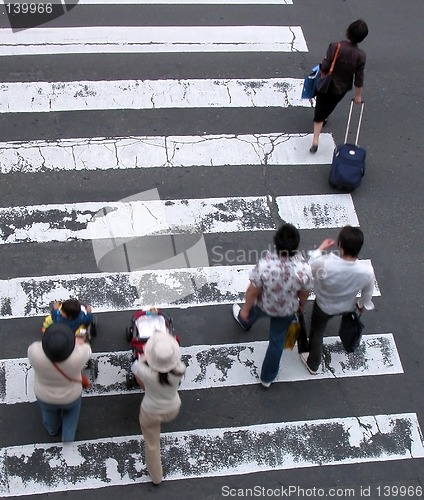 Image of People crossing the street