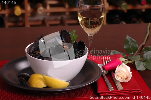 Image of Bowl of mussels in a romantic setting