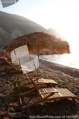 Image of Sunbeds in Perissa, Santorini, Greece