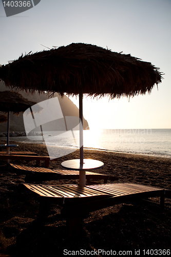 Image of Sunbeds in Perissa, Santorini, Greece