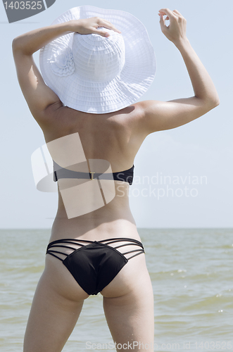 Image of Beautiful woman at the sea