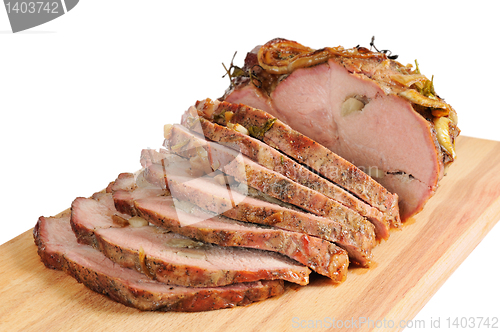 Image of Roast pork on a wooden board