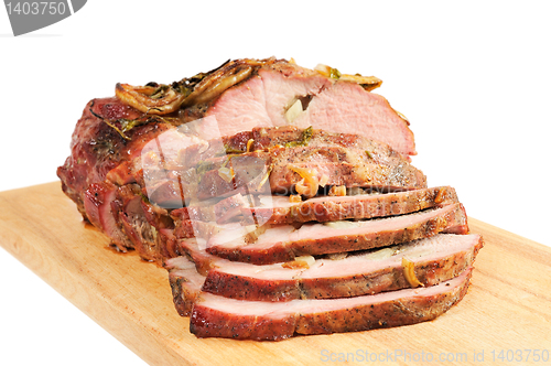 Image of Roast pork on a wooden board