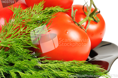 Image of Tomatoes on a black plate