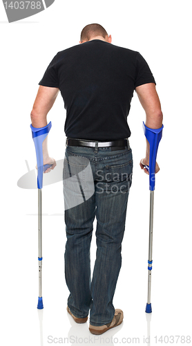 Image of man with crutch