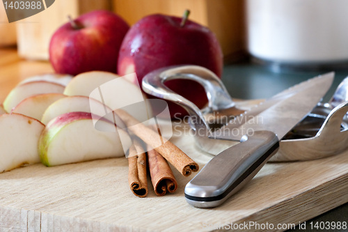 Image of Apple Slices and Cinnamon Sticks