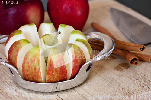 Image of Freshly Sliced Apples and Cinnamon Sticks