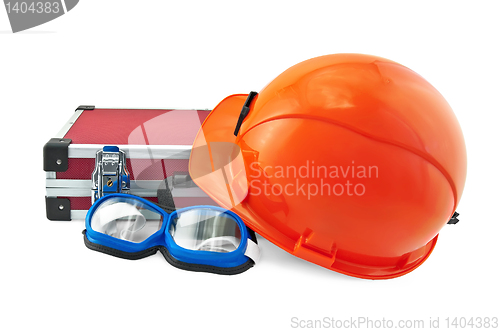 Image of Orange helmet, suitcase and goggle
