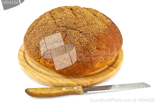 Image of White bread with a knife