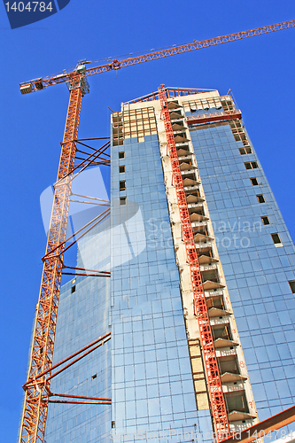 Image of  hoisting-crane   with  building