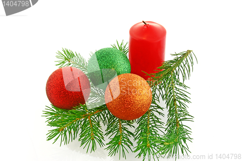 Image of chrismas still life with red candles and balloons