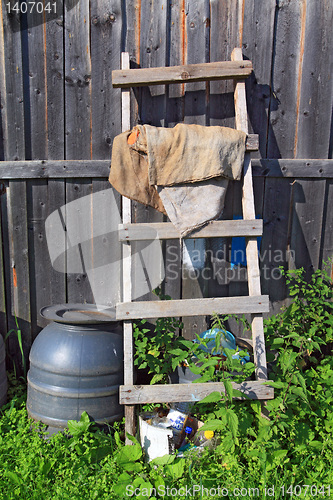 Image of aging stairway near rural shed