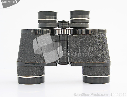 Image of old binoculars on white background