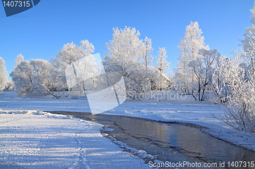 Image of village is on coast to freeze river