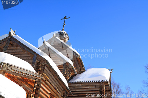 Image of wooden chapel on blue background