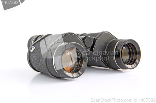 Image of old binoculars on white background