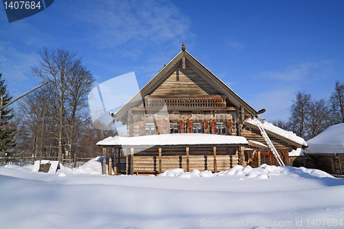 Image of old wooden house in village 