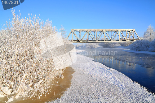 Image of railway bridge on winter river