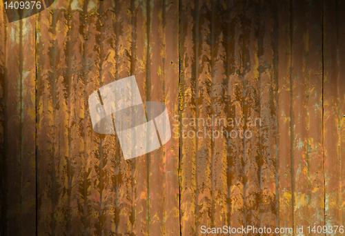 Image of Rusty metal roof lit diagonally