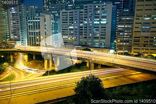 Image of Colorful city night with buildings and bridge