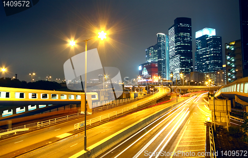 Image of urban landscape at night and through the city traffic 