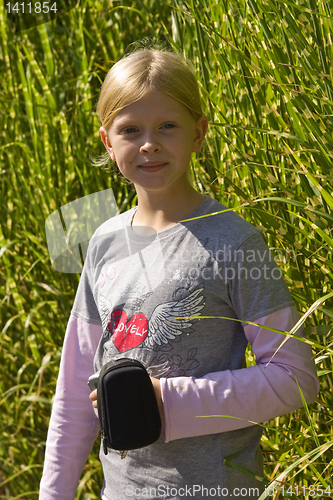 Image of Little girl in the grass