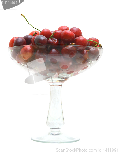 Image of Sweet cherry fruits in a glass vase.