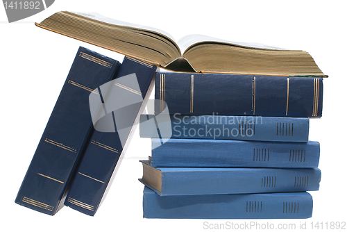 Image of Open book and books.