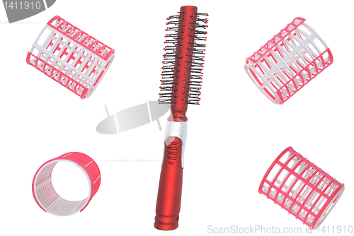 Image of Hair curlers and hairbrush.