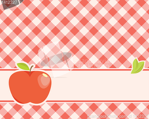 Image of apple on a plaid background