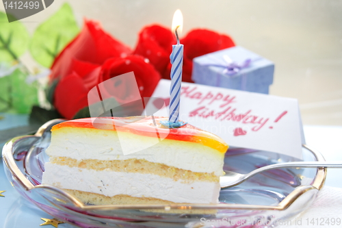 Image of cake with candle for birthday   