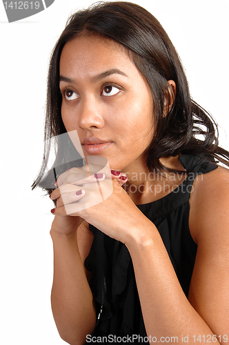 Image of Asian girl looking up.