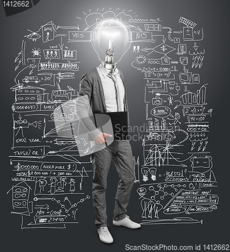 Image of lamp head businessman with laptop