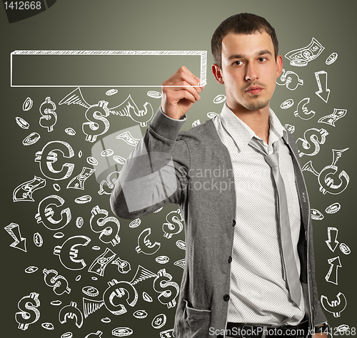 Image of businessman writing something